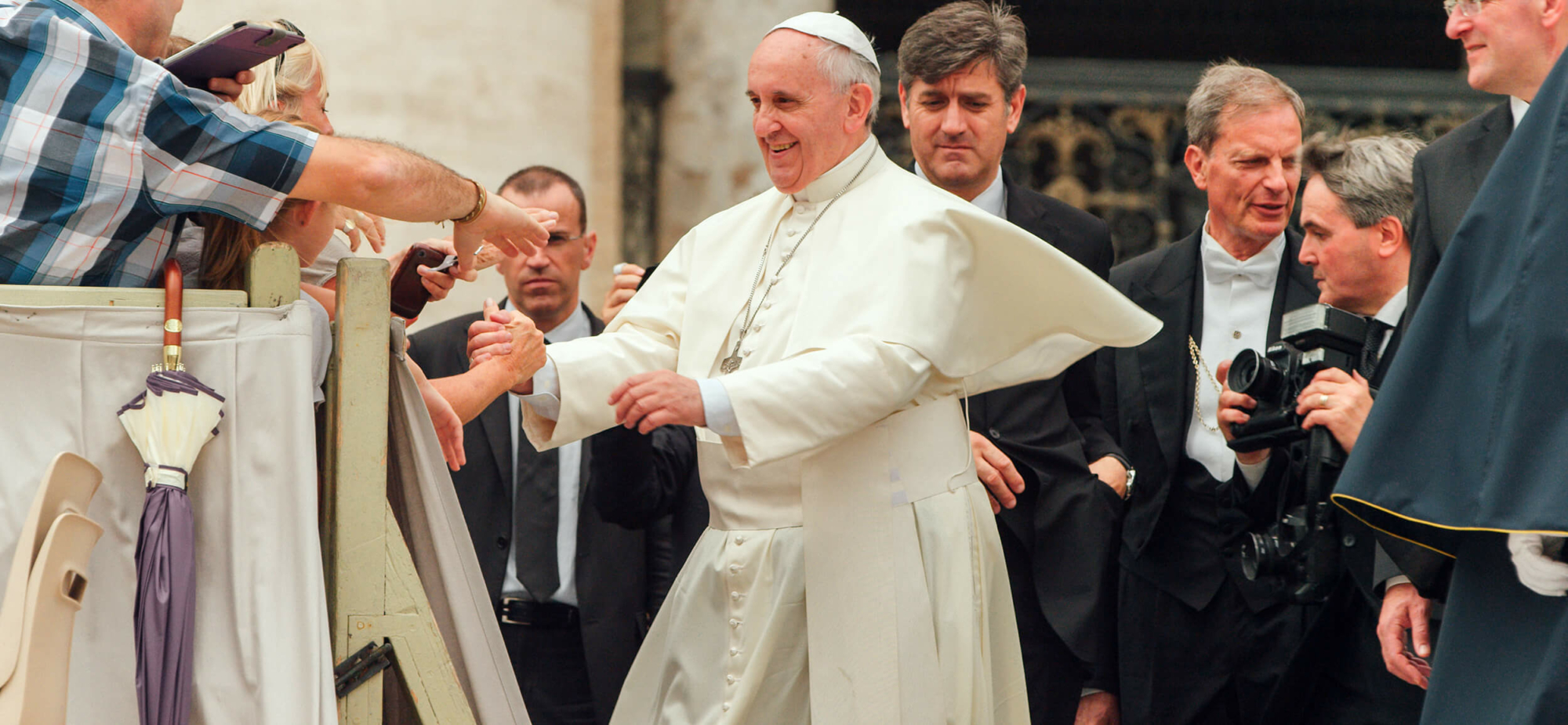 Pope Francis with a crowd of people